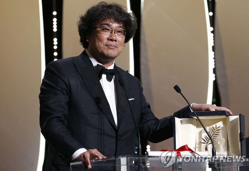 In this Reuters photo, South Korean director Bong Joon-ho wins the Palme d'Or for his film "Parasite" at the 72nd Cannes Film Festival in Cannes, France, on May 25, 2019. (Yonhap)