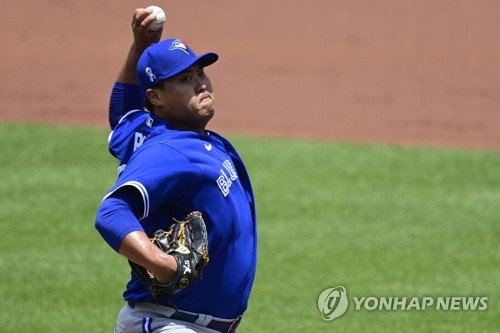 McGuire hits 3 doubles as Ryu, Blue Jays beat Orioles 7-4