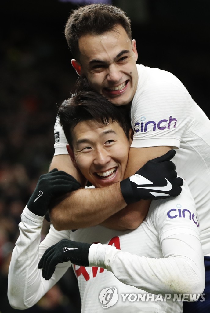 In this Action Images photo via Reuters, Son Heung-min of Tottenham Hotspur (L) is congratulated by teammate Sergio Reguilon after scoring a goal against Brentford during the clubs' Premier League match at Tottenham Hotspur Stadium in London on Dec. 2, 2021. (Yonhap)