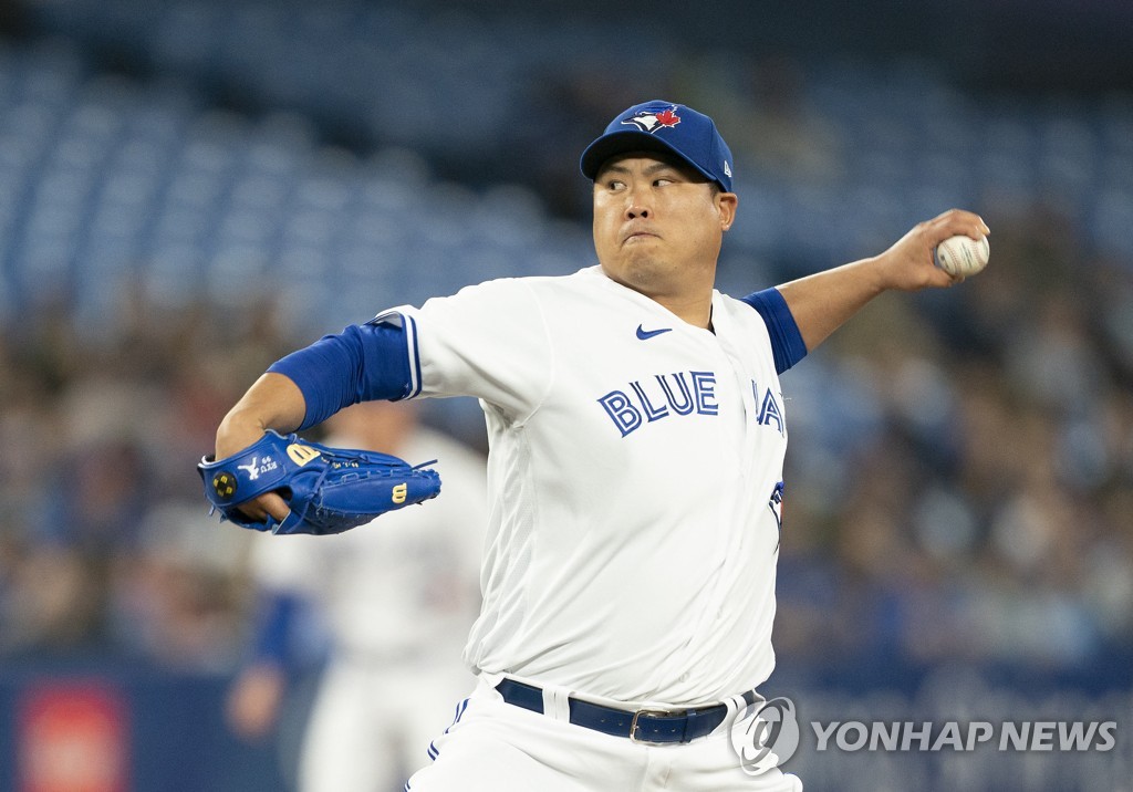 In this USA Today Sports photo via Reuters, Toronto Blue Jays' starter Ryu Hyun-jin pitches against the Oakland Athletics during the top of the first inning of a Major League Baseball regular season game at Rogers Centre in Toronto on April 16, 2022. (Yonhap)