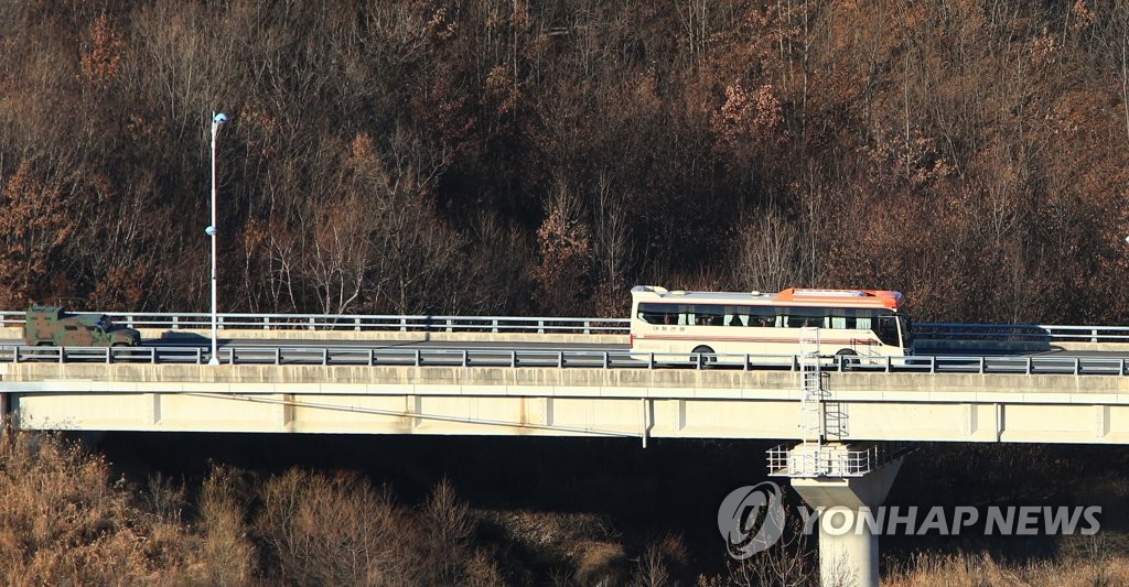 A bus with a group of South Korean officials and experts on board travels to North Korea on the eastern coast on Dec. 8, 2018, for a 10-day probe of the North's eastern rail system as part of efforts to connect railways along the divided peninsula. (Yonhap)