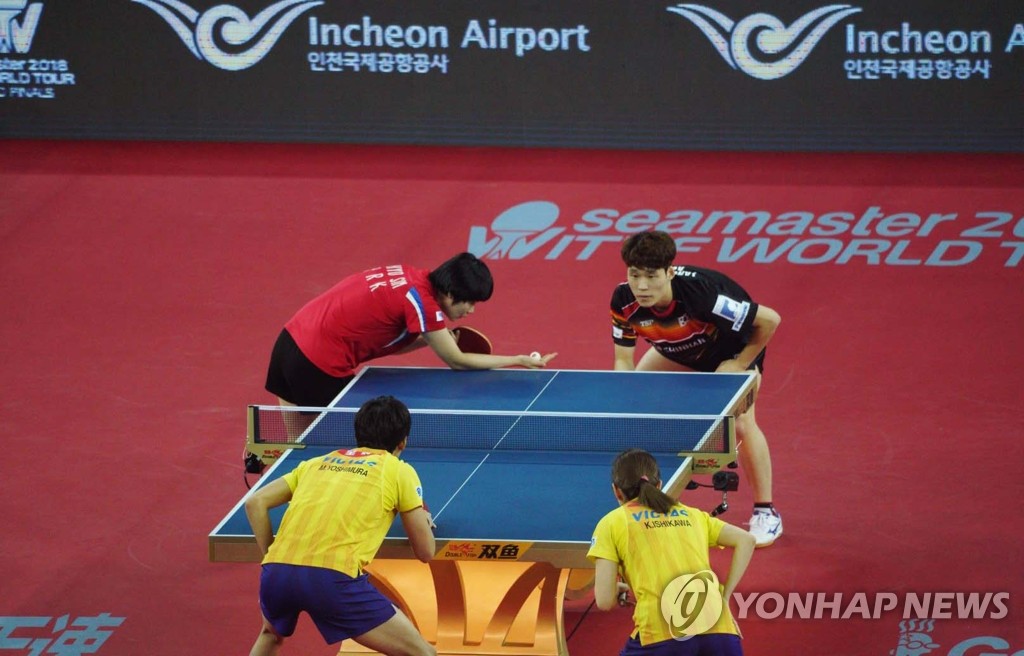 Unified Korean ping pong team wins 1st match at major tourney to take on S. Koreans