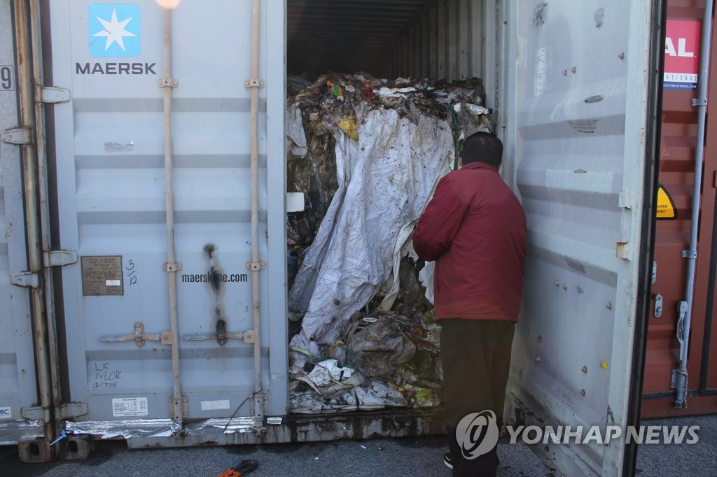 This photo, provided by the Ministry of Environment on Feb. 7, 2019, shows a container loaded with plastic waste that was brought back to South Korea after being illegally shipped to the Philippines last year. (Yonhap) 