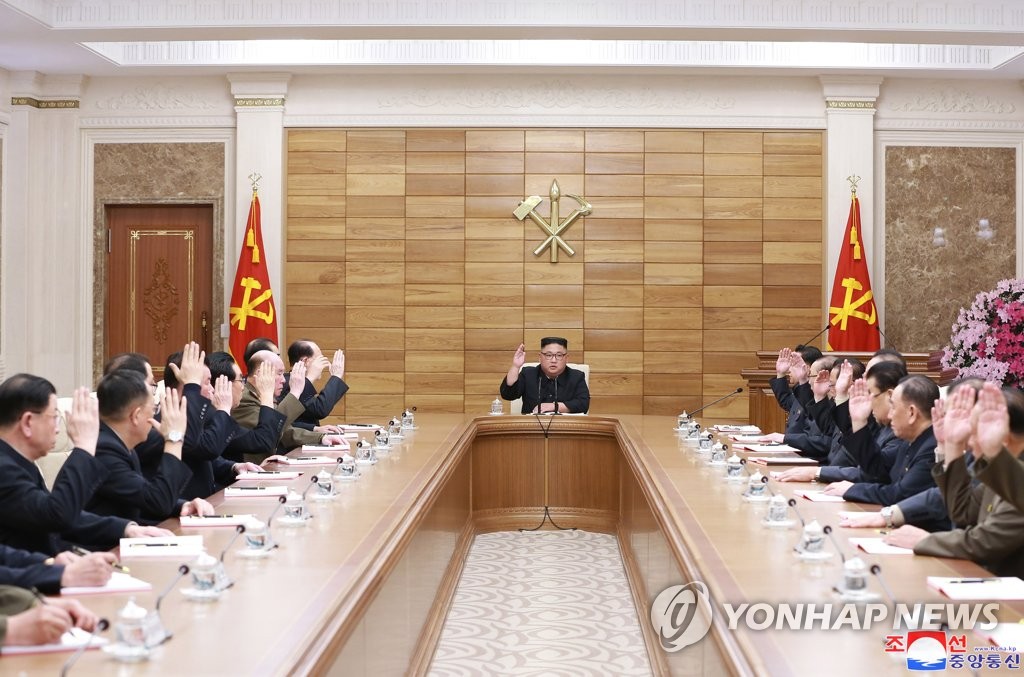 North Korean leader Kim Jong-un (C) presides over an enlarged meeting of the Political Bureau of the Central Committee of the Workers' Party of Korea in Pyongyang on April 9, 2019, in this photo released by the Korean Central News Agency the next day. (For Use Only in the Republic of Korea. No Redistribution) (Yonhap)