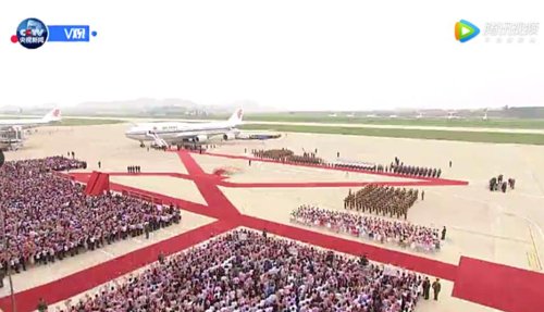 N. Koreans welcoming Xi's arrival in Pyongyang