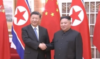 (LEAD) Xi heads back home after state visit in N. Korea