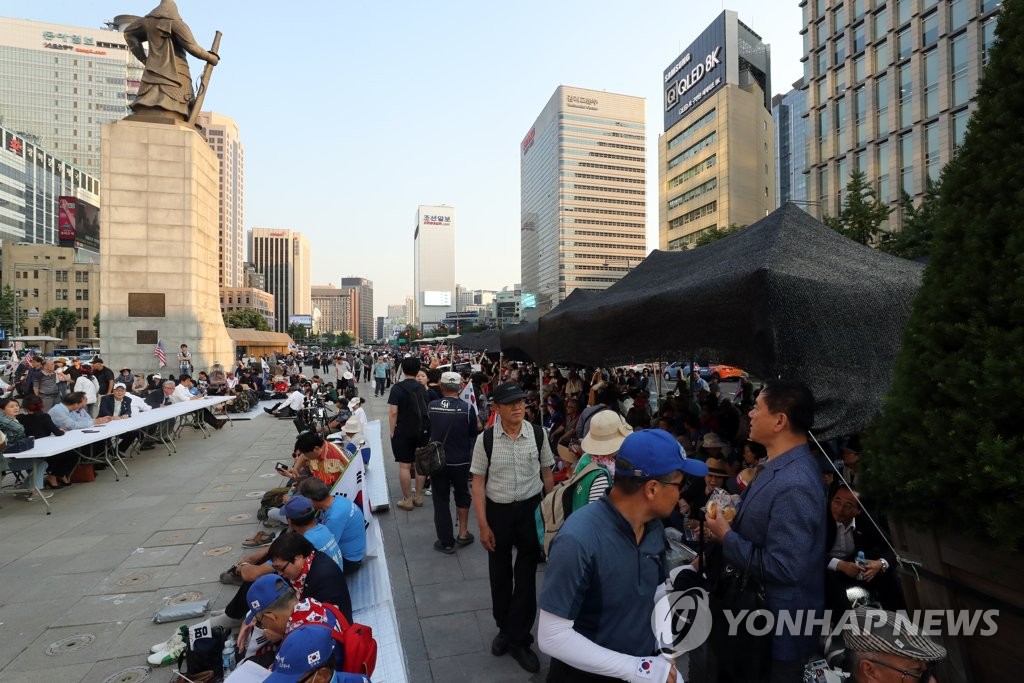 Members of the Our Republican Party, a far-right opposition party, gather at their protest tents set up on Gwanghwamun Square in central Seoul on June 25, 2019. (Yonhap)
