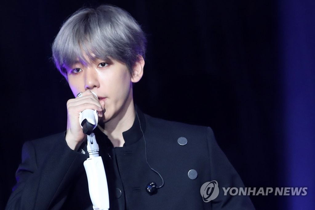 In this file photo, Baekhyun, a member of South Korean boy band EXO, performs during a showcase for his first mini album, "City Lights," at a concert hall in Seoul on July 10, 2019. (Yonhap)