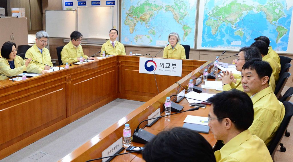 Foreign Minister Kang Kyung-wha (C) presides over a video conference with the heads of South Korean missions in China to assess the situation of the coronavirus outbreak in Seoul, on Feb. 19, 2020. (PHOTO NOT FOR SALE) (Yonhap)