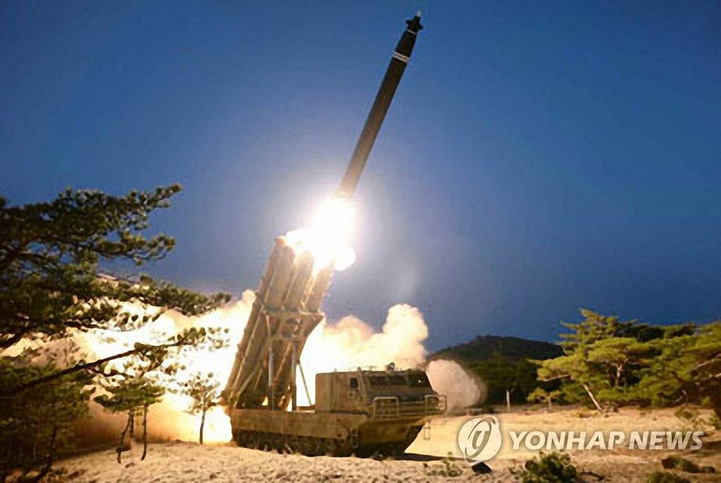 This undated file photo captured from the homepage of the Rodong Sinmun shows a North Korean rocket launch. (For Use Only in the Republic of Korea. No Redistribution) (Yonhap)