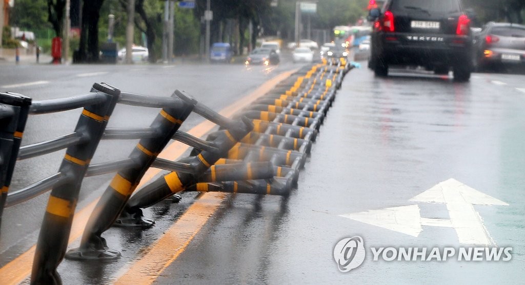 A road facility on the southern resort island of Jeju is damaged by strong winds on Aug. 26, 2020. (Yonhap)
