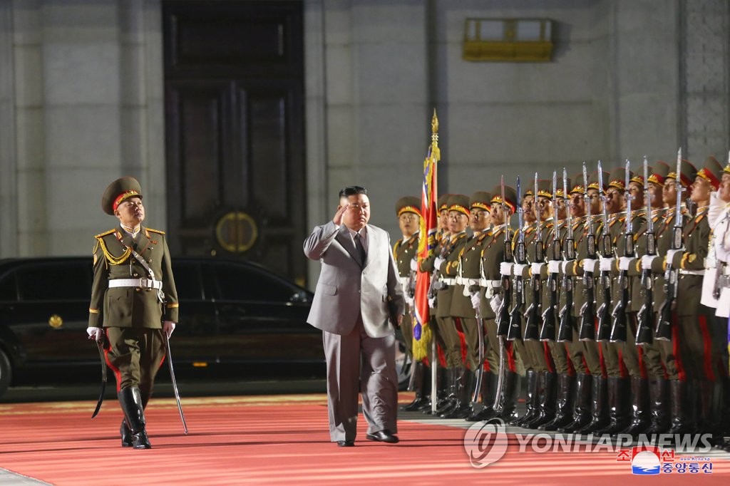 North Korean leader Kim Jong-un (C) attends a military parade at Kim Il-sung Square in Pyongyang on Oct. 10, 2020, to mark the 75th founding anniversary of the Workers' Party, in this photo released by the North's Korean Central News Agency. (For Use Only in the Republic of Korea. No Redistribution) (Yonhap)
