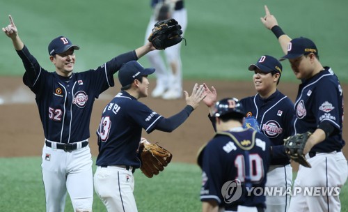 Doosan Bears' Christopher Flexen pitches against NC Dinos