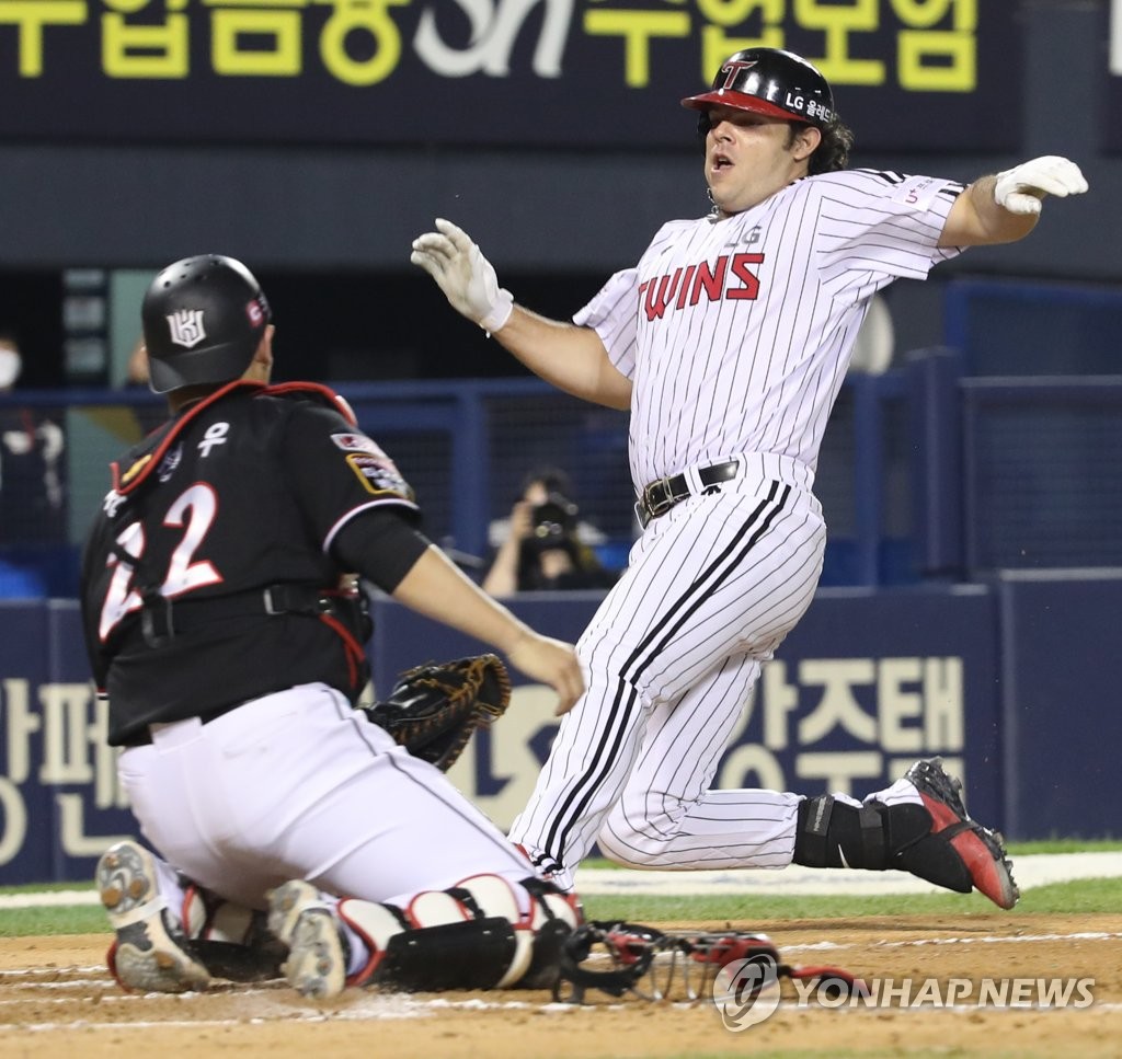 In this file photo from June 2, 2021, Roberto Ramos of the LG Twins is thrown out at home plate against the KT Wiz in the bottom of the sixth inning of a Korea Baseball Organization regular season game at Jamsil Baseball Stadium in Seoul. (Yonhap)