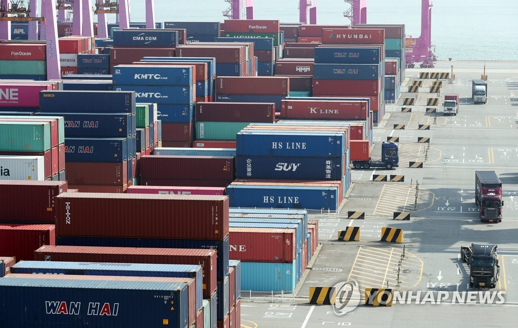 This file photo, taken Sept. 9, 2021, shows stacks of containers at a port in Incheon, 40 kilometers west of Seoul. (Yonhap)