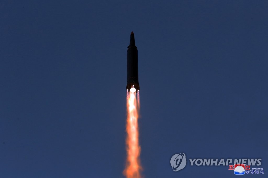 This photo, released by North Korea's official Korean Central News Agency on Jan. 12, 2022, shows what the North claims to be a new hypersonic missile being launched the previous day. North Korean leader Kim Jong-un, who watched the firing, "appreciated the practical achievements" made by those involved in research related to the missile development. South Korea's defense ministry said the previous day the North fired what appeared to be a ballistic missile into the East Sea. (For Use Only in the Republic of Korea. No Redistribution) (Yonhap)