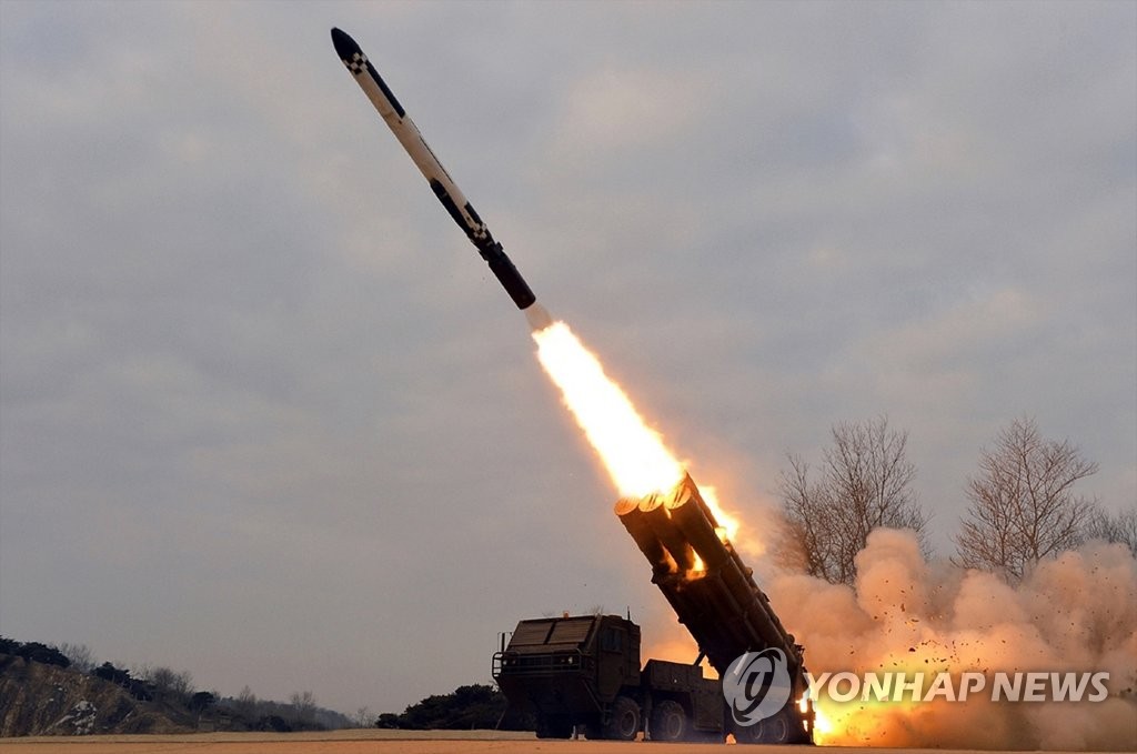 This photo, released by North Korea's official Korean Central News Agency on Jan. 28, 2022, shows a long-range cruise missile being launched from a transporter erector launcher Jan. 25. North Korea confirmed this week's two rounds of weapons tests involving a long-range cruise missile and surface-to-surface tactical guided missiles, and vowed to "keep developing powerful warheads." (For Use Only in the Republic of Korea. No Redistribution) (Yonhap)