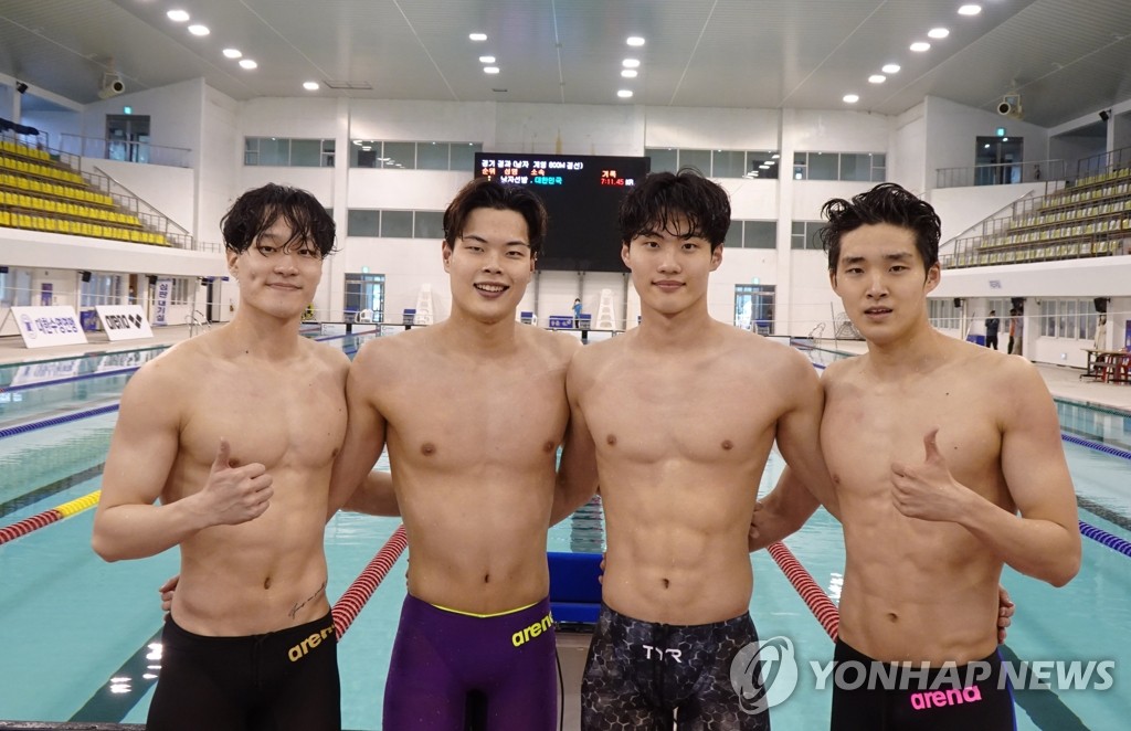 This April 18, 2022, file photo provided by the Korea Swimming Federation shows members of the South Korean men's 4x200m freestyle relay team. From left: Lee Yoo-yeon, Lee Ho-joon, Hwang Sun-woo and Kim Woo-min. (PHOTO NOT FOR SALE) (Yonhap)