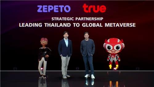 This photo provided by Naver Z shows Kang Hee-suk (L), the company's head of business, and Birathon Kasemsri, chief content and media officer at True, at a signing ceremony for the companies' memorandum of understanding for a metaverse strategic partnership. (PHOTO NOT FOR SALE)