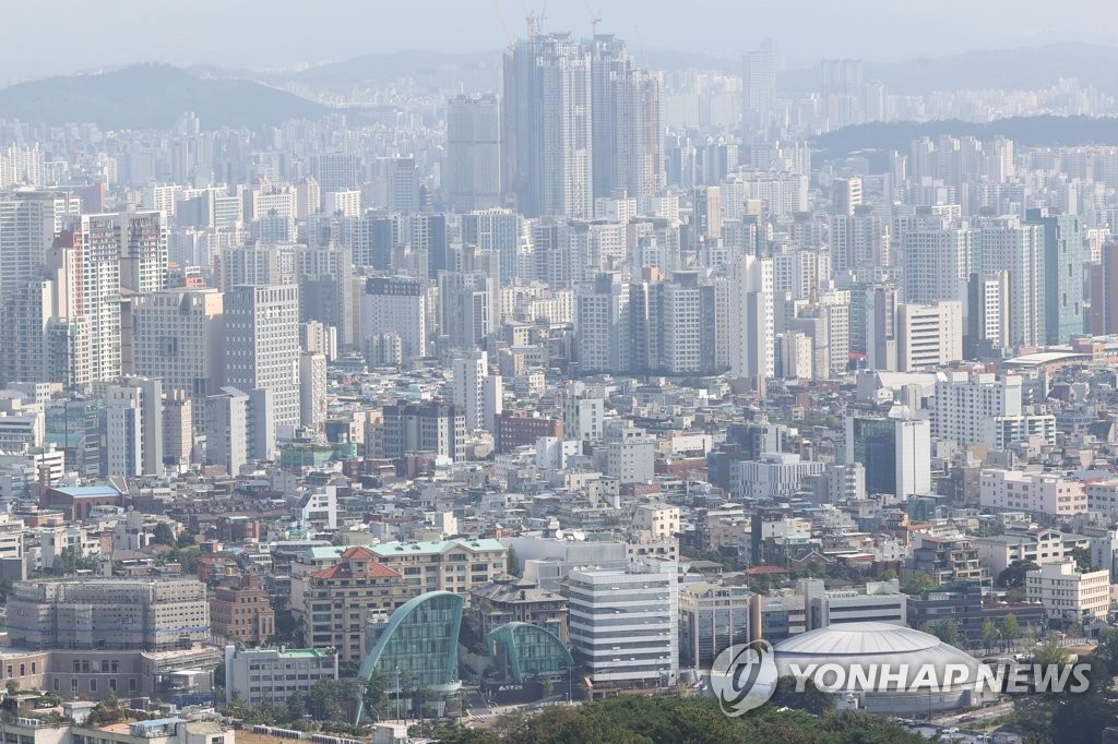This file photo from Sept. 23, 2022, shows downtown Seoul seen from Mount Nam filled with apartment complexes and buildings. 