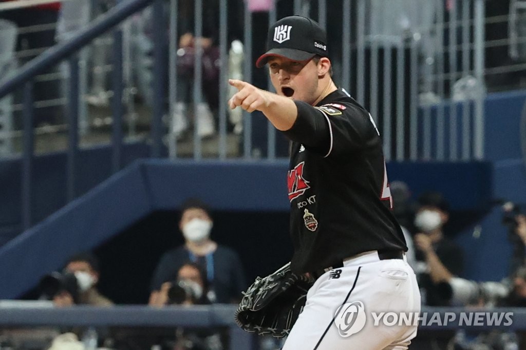 In this file photo from Oct. 17, 2022, KT Wiz starter Wes Benjamin celebrates after retiring the side in the bottom of the third inning of Game 5 of the first round in the Korea Baseball Organization postseason against the Kiwoom Heroes at Gocheok Sky Dome in Seoul. (Yonhap)