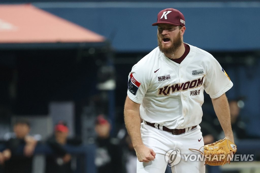 Kiwoom Heroes starter Tyler Eppler celebrates after striking out Moon Bo-gyeong of the LG Twins during the top of the sixth inning of Game 4 of the second round in the Korea Baseball Organization postseason at Gocheok Sky Dome in Seoul on Oct. 28, 2022. (Yonhap)