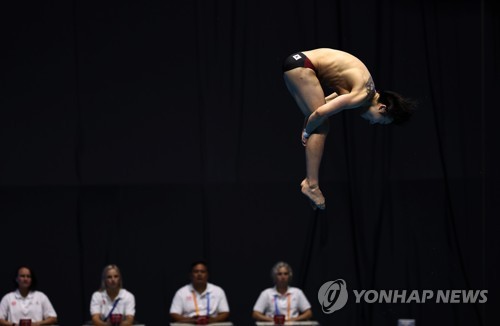 (Asiad) S. Korean diver Woo Haram bags 9th Asian Games medal
