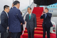 (LEAD) PM arrives in China for Asian Games, meeting with Xi