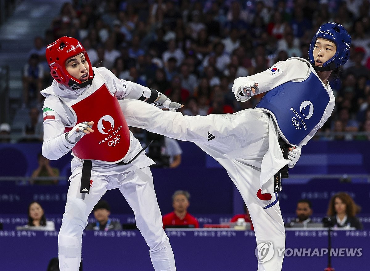 (Olympics) Unheralded athlete reaches top of taekwondo podium after