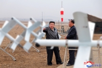 (2nd LD) N. Korea's Kim orders mass production of suicide attack drones: KCNA