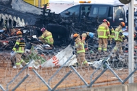 韓国旅客機事故２日目　死者１７９人中１４０人の身元確認