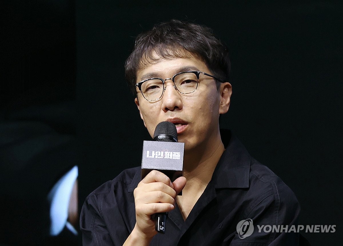 Director Yoon Jong-bin of Disney+'s new Korean original series "Nine Puzzles" speaks during a press conference at a Seoul hotel on May 14, 2025. (Yonhap)
